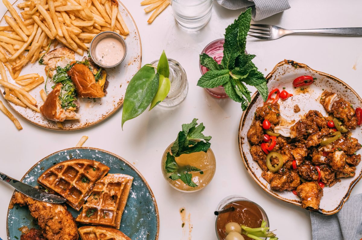 Overhead spread of Cork to Fork dishes and cocktails