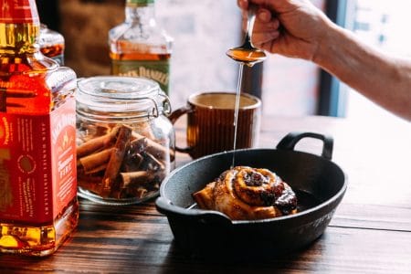 Apple Jack Cinnamon Roll leveled up with apple-cinnamon syrup featuring Jack Daniel's Tennessee Apple.